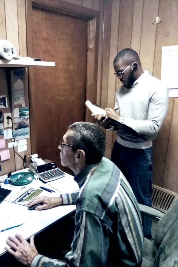 Reviewing records with facility staff at the terminal office